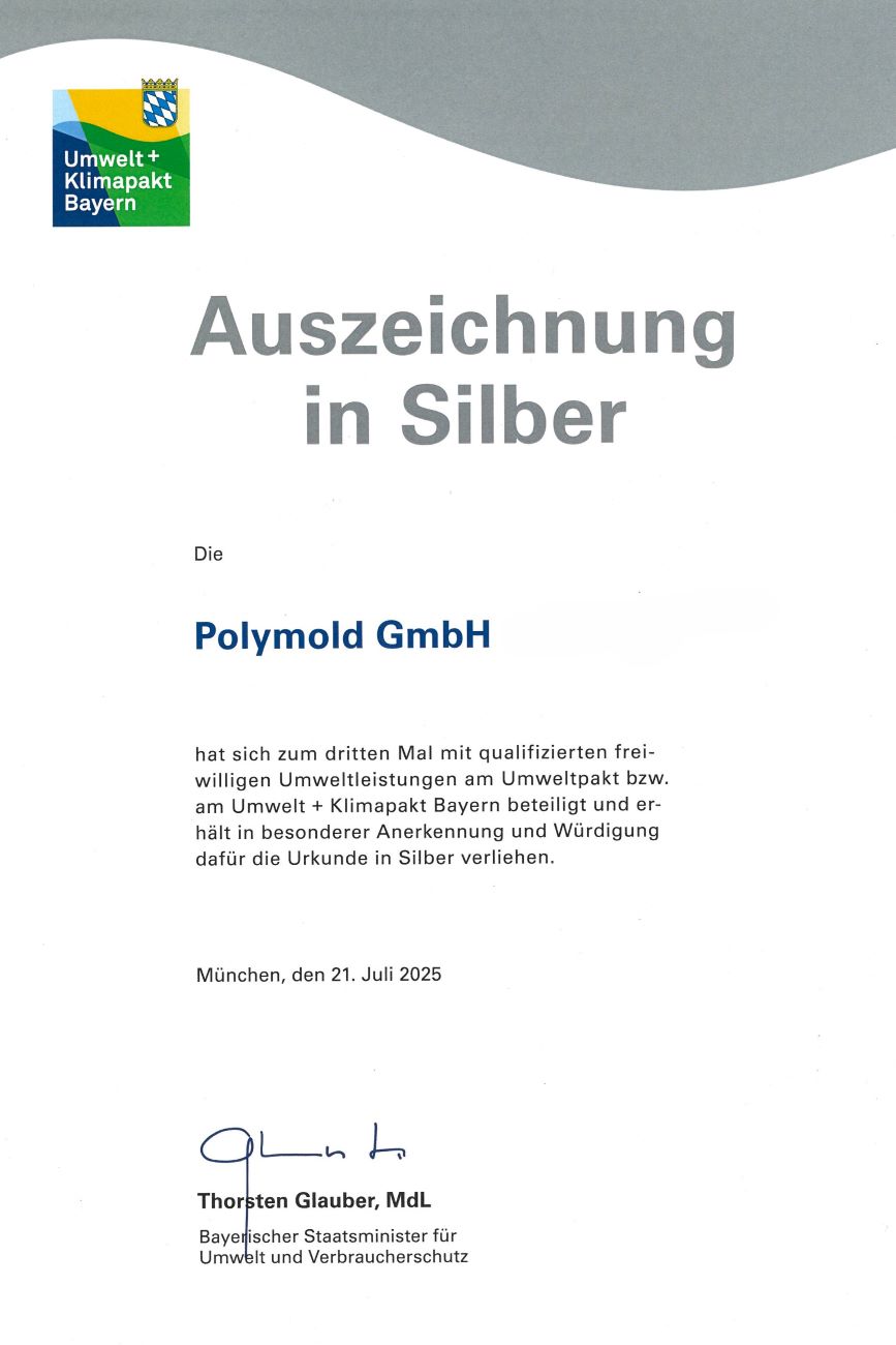 Silber-Urkunde vom Umweltpakt Bayern für POLYMOLD für langjähriges, freiwilliges Umwelt- und Klimaschutz-Engagement